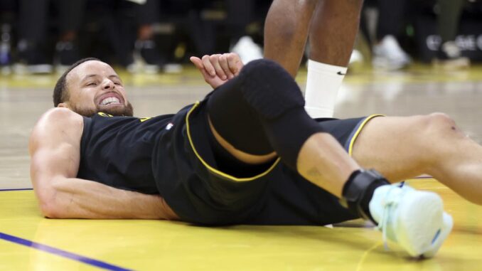 NBA: Stephen Curry taken for MRI after Warriors star leaves game with pelvic injury
